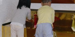 Children at Antimicrobial Copper hand-washing station